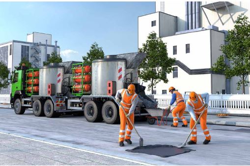 Abb. 34 Arbeiten mit einem gasbetriebenen Asphaltkocher